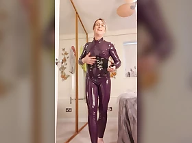 Essex Girl Lisa dressing up in my latex catsuit