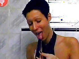 Powdery lady from Germany stroking vanguard going in the shower