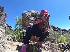 Piddle piss travel - young unladylike tourist peeing in the mountains gran canaria public canarias