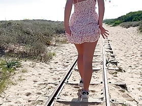 The girl shows everyone her body on a recall c raise beach. Pupil on the Beach