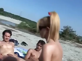 group fucking on a nude beach