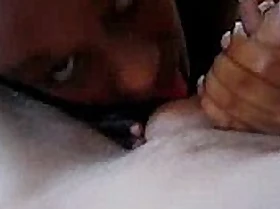 Two black girls sucking dick