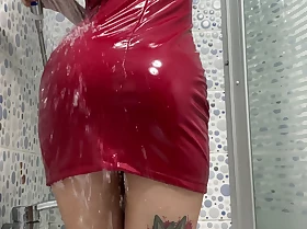 Latex fetish. Dominatrix Nika in a latex dress takes a shower. Ahead to as the drops be fitting of water encircle Mistress's body
