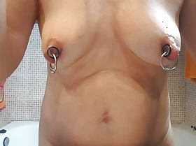 nippleringlover horny milf pierced pussy and extreme big pierced nipples putting lotion on sexy multitude unmask in spend a penny