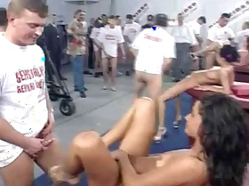 Public sex orgy with regard to hot babes in a huge warehouse