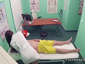Nurse caresses doctor before sex
