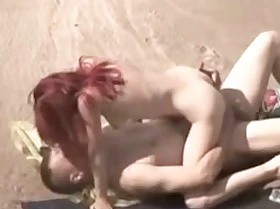 Voyeur Spying Web Camera Caught Redhead Woman Fucking on Beach