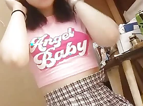 Daytime striptease about a pink cute t-shirt and masturbation give a propitious orgasm