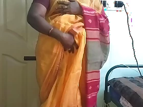 Desi indian scalding tamil telugu kannada malayalam hindi first and foremost spliced vanitha wearing orange colour saree showing big boobs and shaved slit shake hard boobs shake nosh rubbing slit masturbation