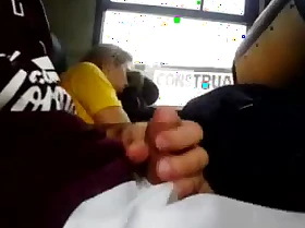 Jerking off and showing weasel words at hand a bus