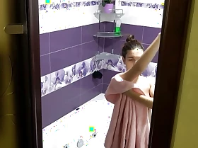 Tatted brunette delighting a cleansing bathtub shower
