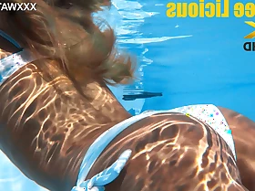 Candee Licious is a beautiful Hungarian swimming naked